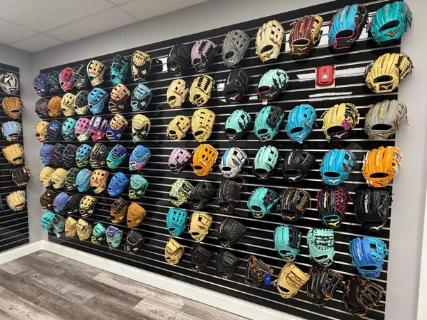 Wall of Wilson and Mizuno gloves